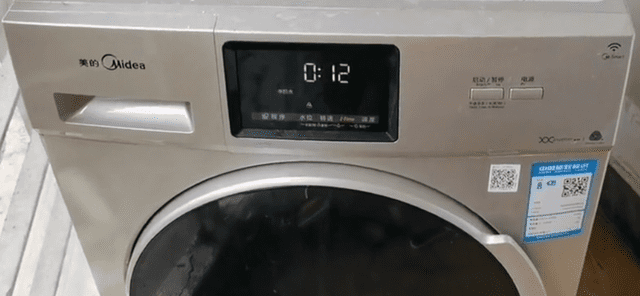 美的滚筒洗衣机如何全拆清洗